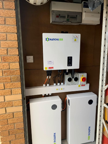 Hanchu ESS inverter and batteries installed in an outdoor cabinet